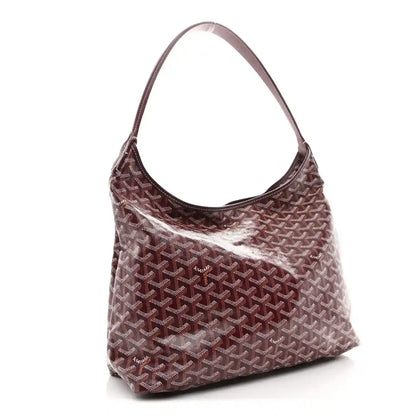 Burgundy Goyardine-pattern hobo shoulder bag with curved handles and side profile