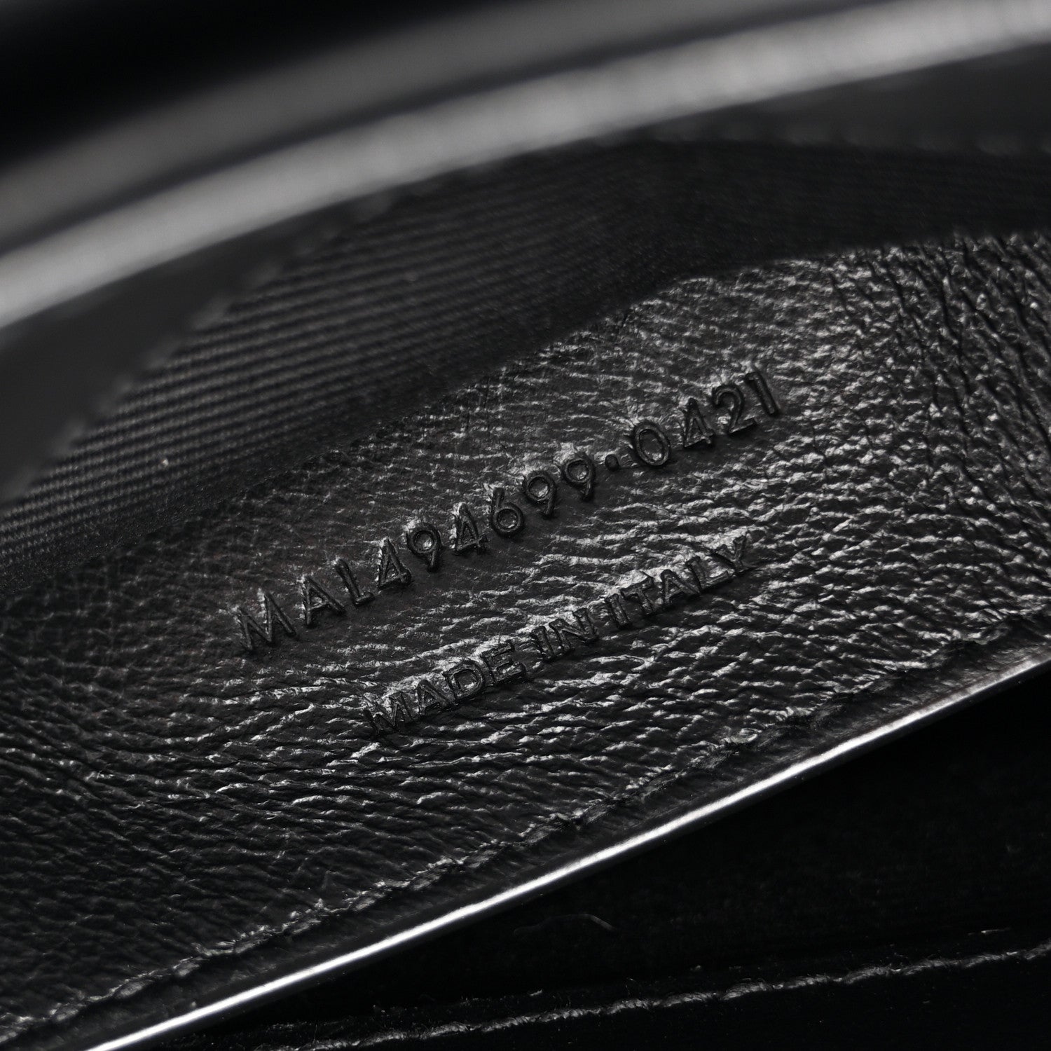 Black leather with embossed 'Made in Italy' stamp