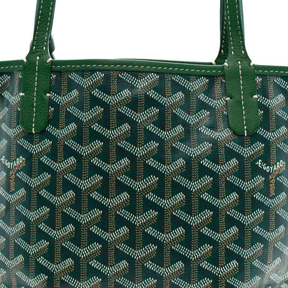 Reversible mini tote with green-trim patterned canvas and twin top handles