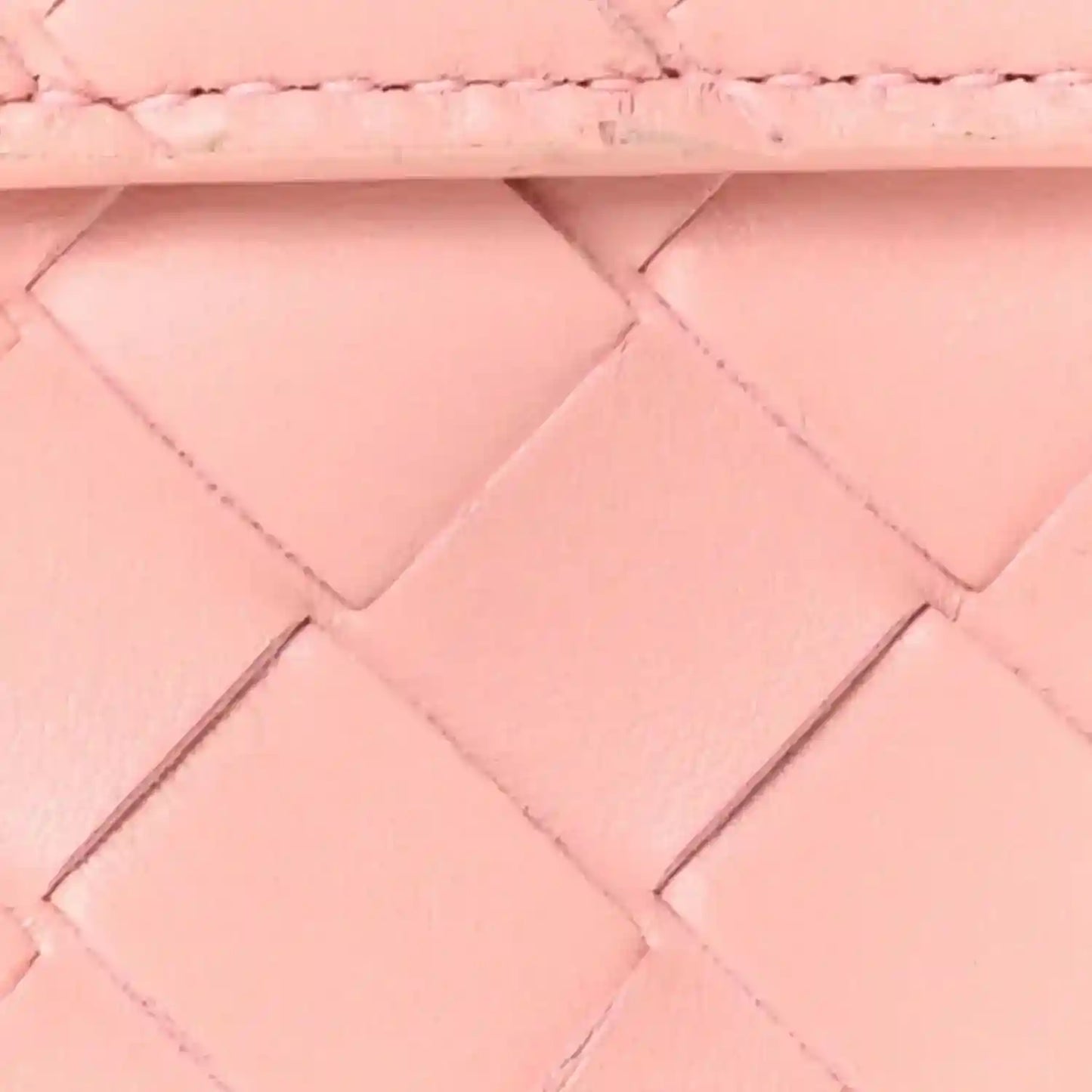 Rose pink nappa leather clutch, intrecciato pattern panels and stitching