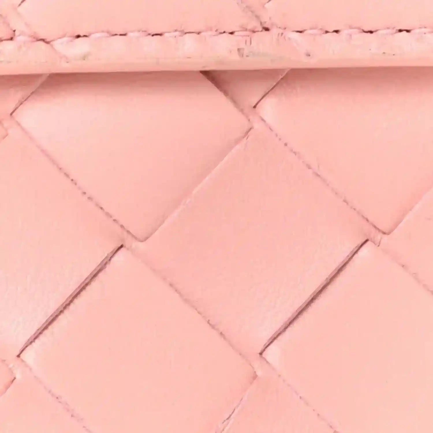 Rose pink nappa leather clutch, intrecciato pattern panels and stitching