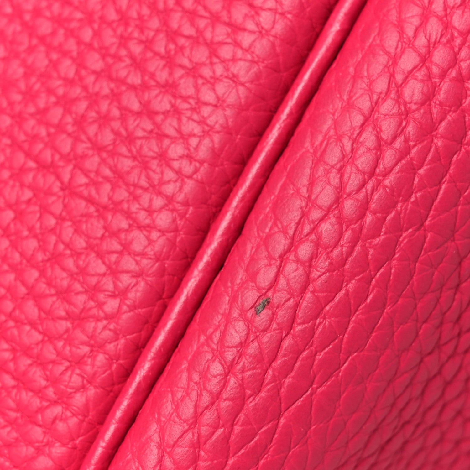 Rose pink leather handle edge with pebble-grain texture