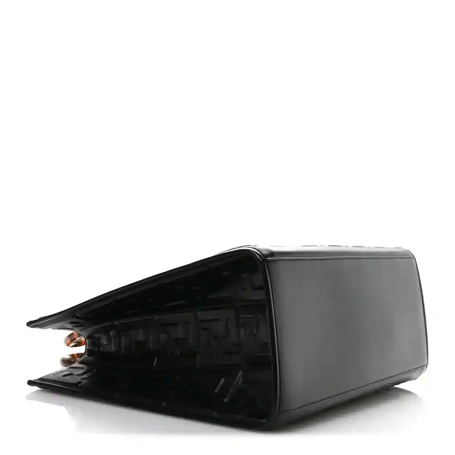Black leather tote bag with embossed FF pattern on side, structured top opening