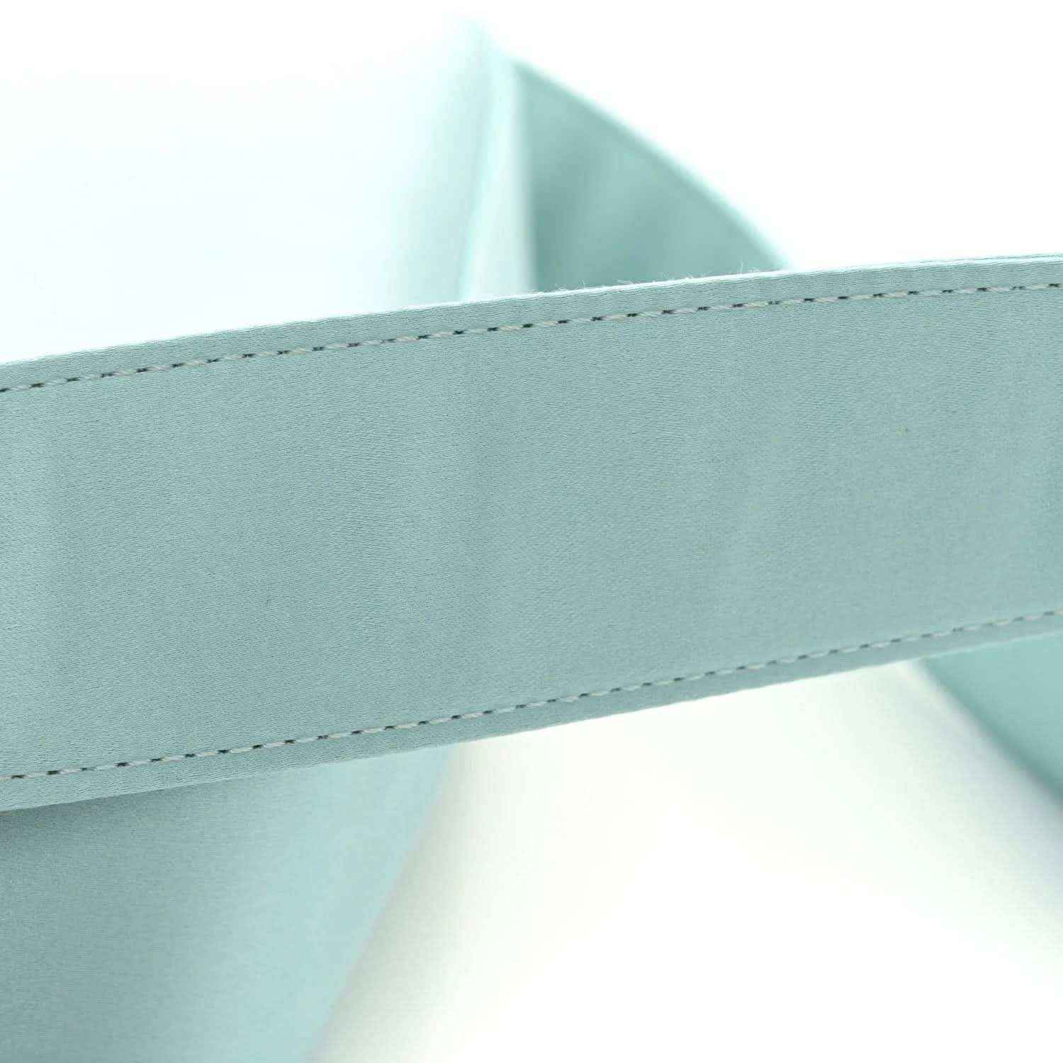 Light blue satin nappa baguette bag, front panel seam and curved edge