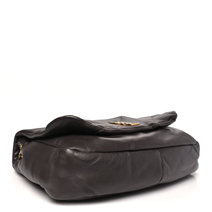 Quilted dark-brown shoulder bag with soft leather folds, gold hardware and chain strap