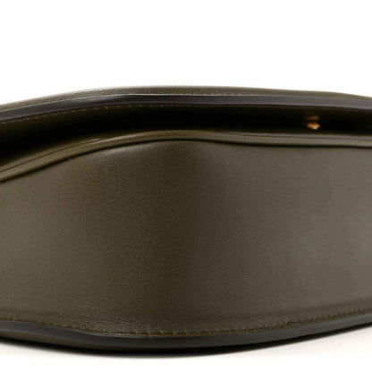 Gucci medium Blondie bag, forest green leather close-up of smooth side panel texture