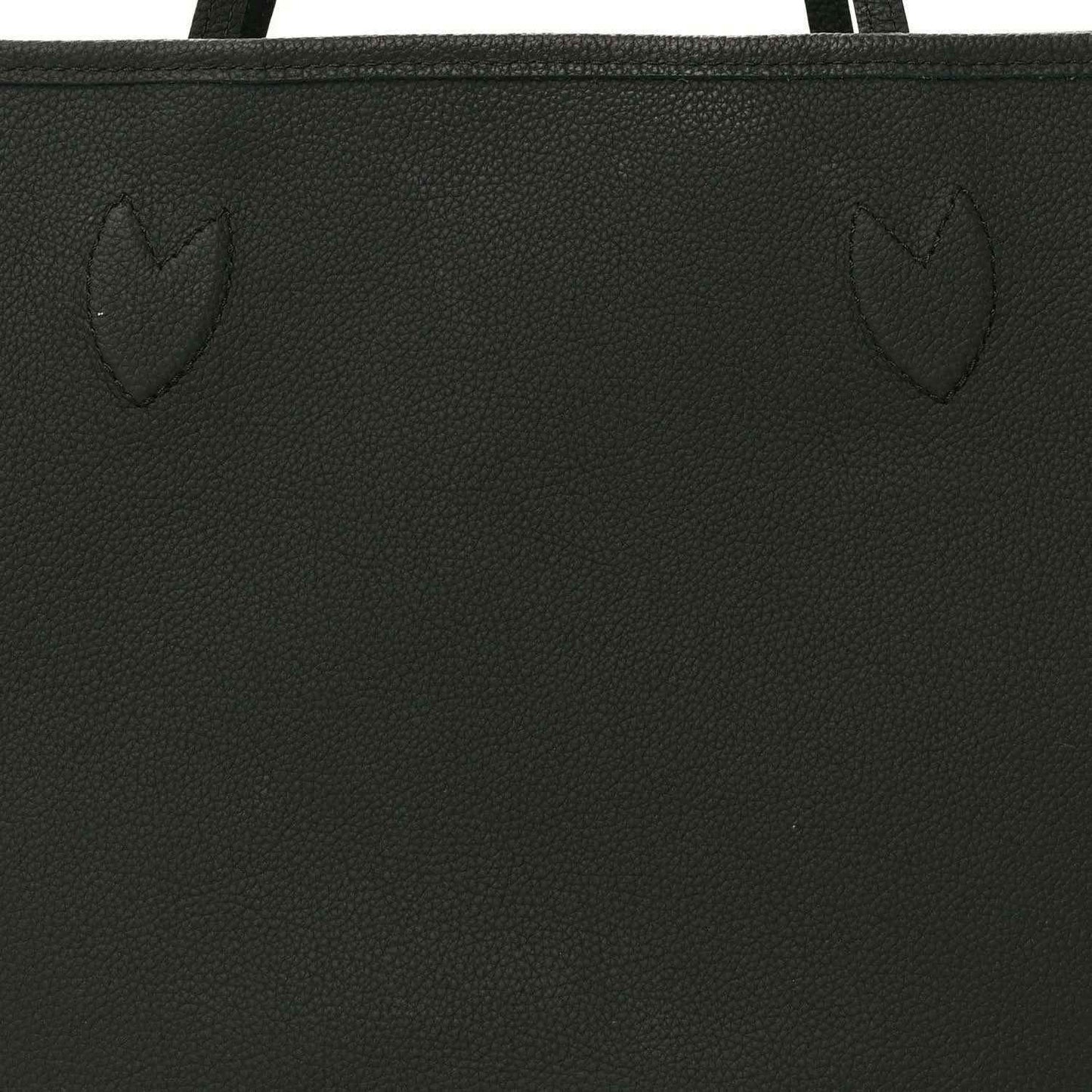 Black textured tote bag panel with stitched seam and embossed pattern
