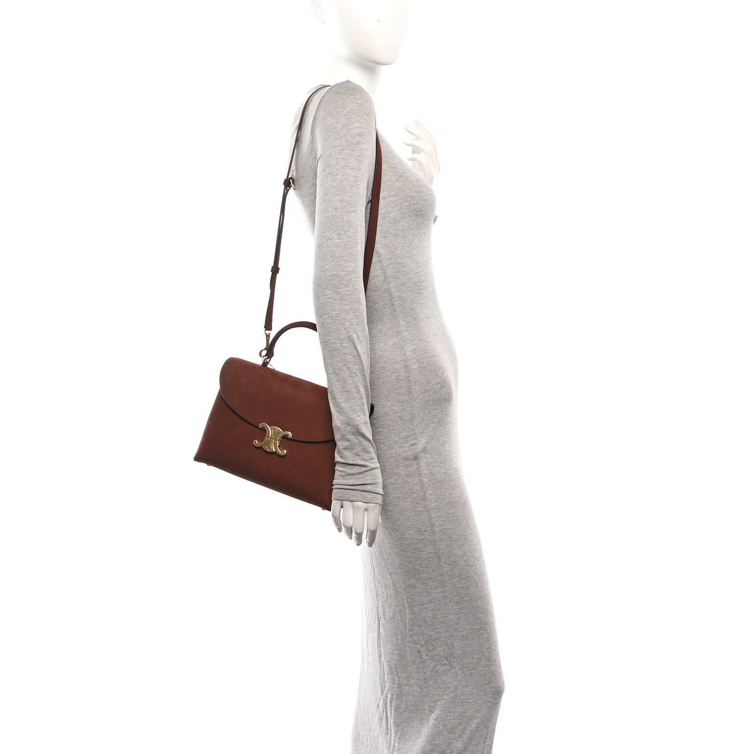 Chestnut brown leather satchel with shoulder strap and Celine logo emblem.