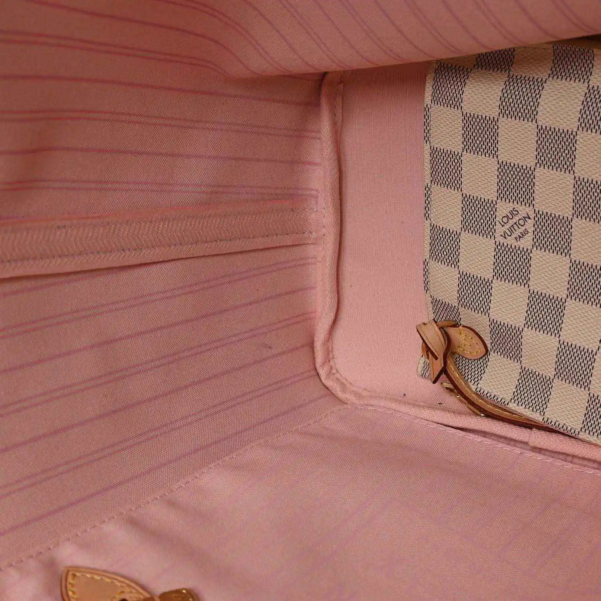 Louis Vuitton tote bag interior with light pink lining and side pocket