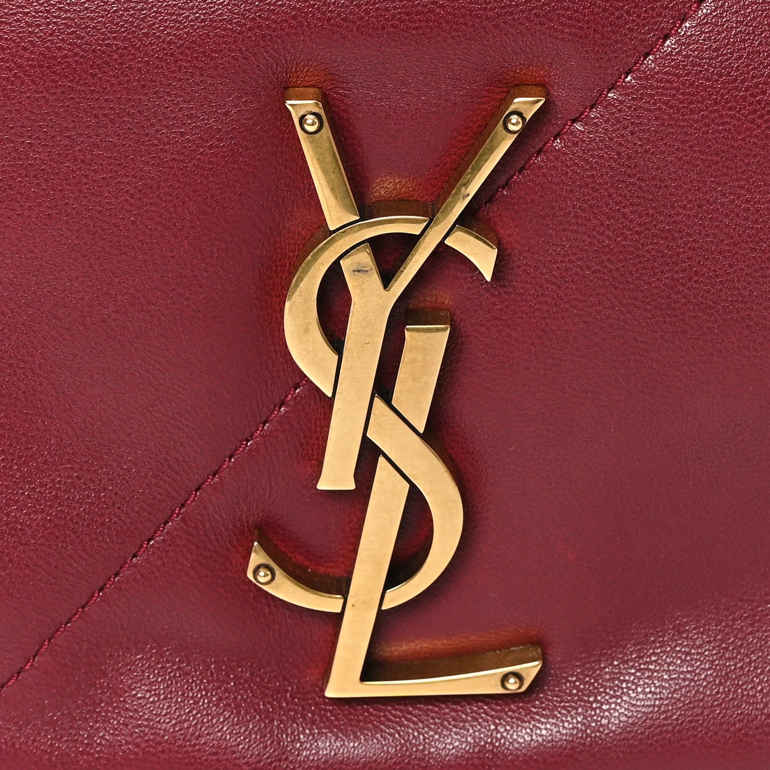 Gold YSL monogram hardware on dark bordeaux quilted lambskin