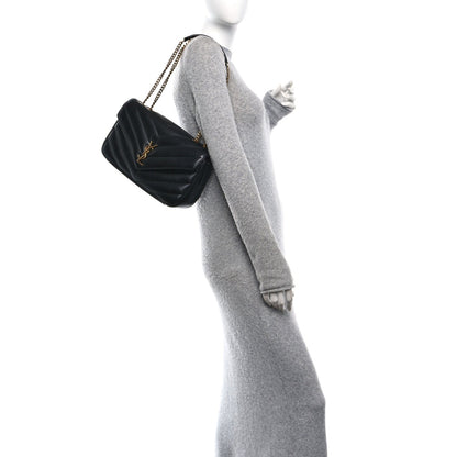 Black quilted leather mini shoulder bag with gold YSL logo and chain strap