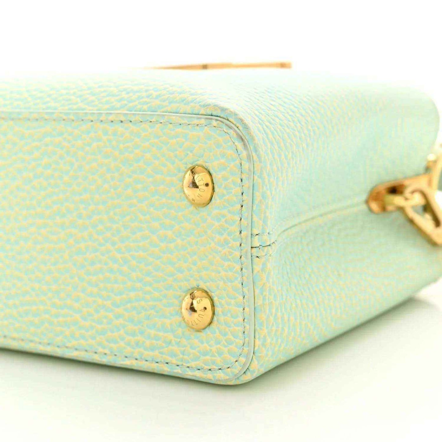 Mini Capucines handbag light green textured leather with gold corner hardware