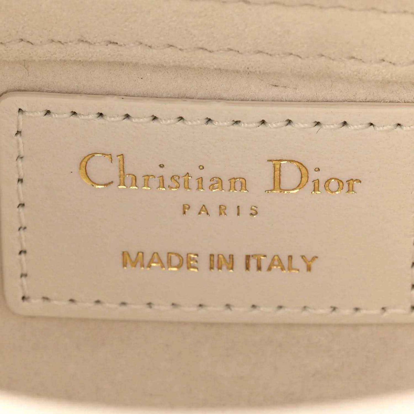 Cream interior label reading Christian Dior PARIS and MADE IN ITALY