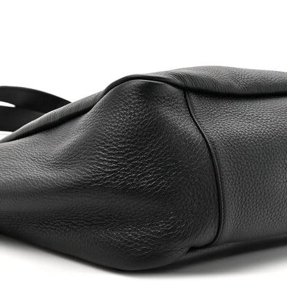 Black grained deerskin Bea tote close-up of textured leather and side panel seam
