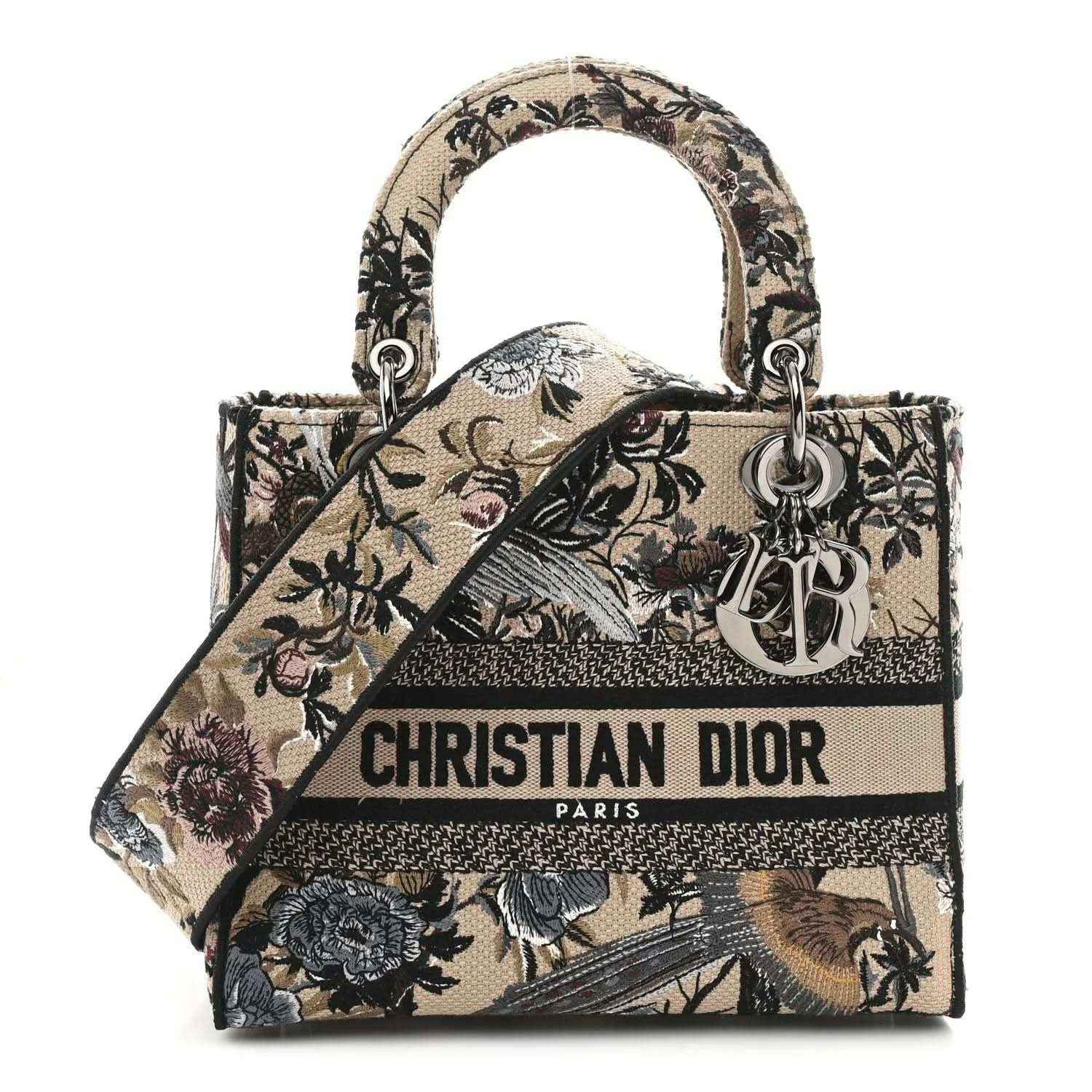 Floral embroidered canvas tote with top handles and Christian Dior logo front band.