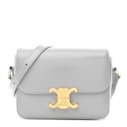 Shiny calfskin shoulder bag with flap and gold-tone front logo clasp