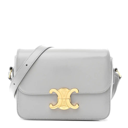 Shiny calfskin shoulder bag with flap and gold-tone front logo clasp
