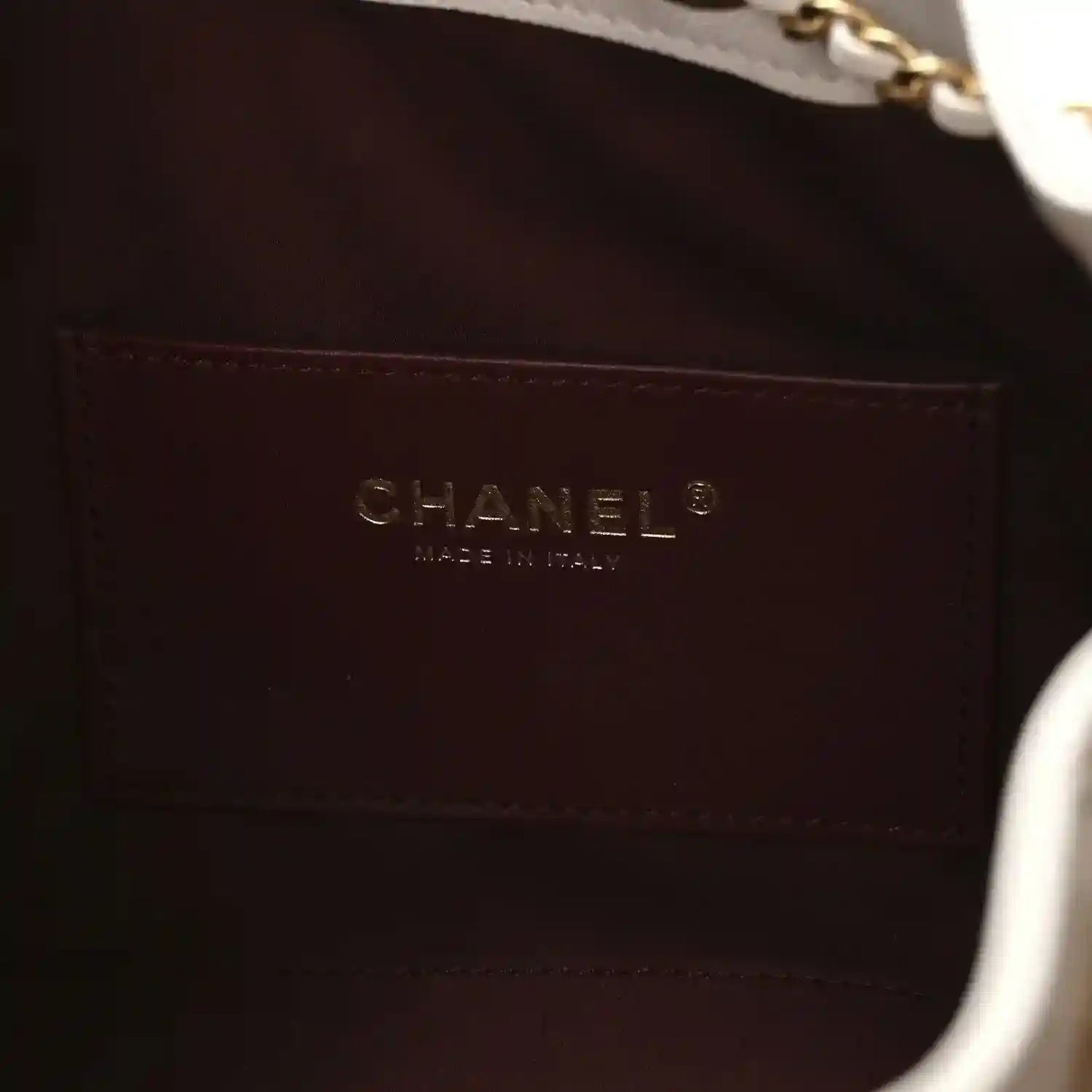 Chanel quilted mini handbag, dark leather interior with CHANEL stamp