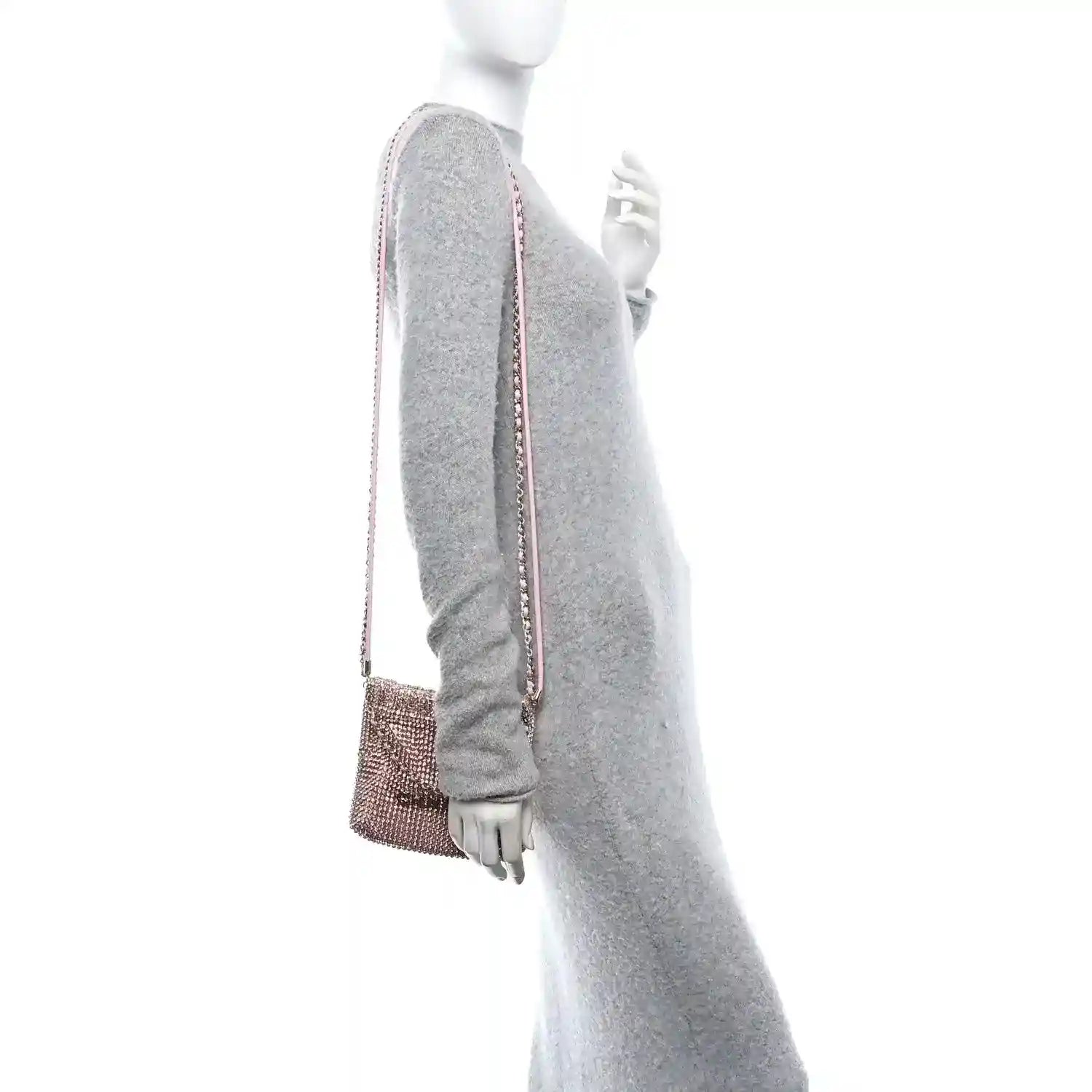 Chanel Mini 22 handbag, pink crystal-embellished body with short shoulder strap.