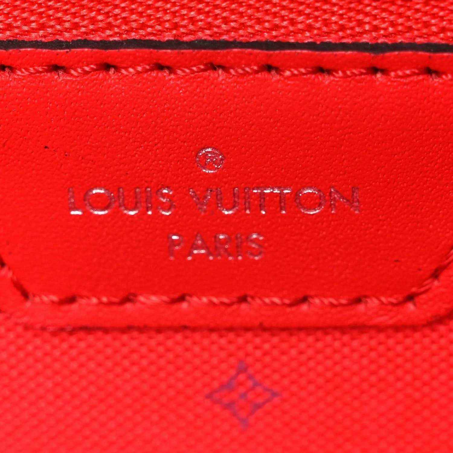 Red leather Louis Vuitton Paris label with stitched edge