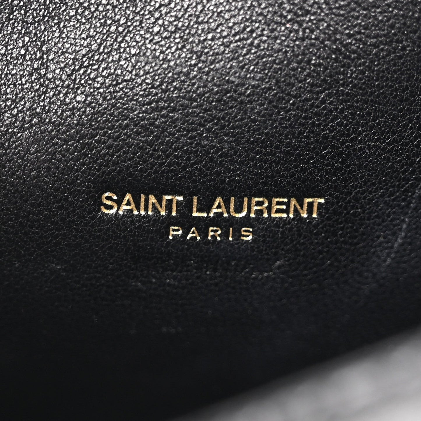 Black leather lining with Saint Laurent Paris logo stitching