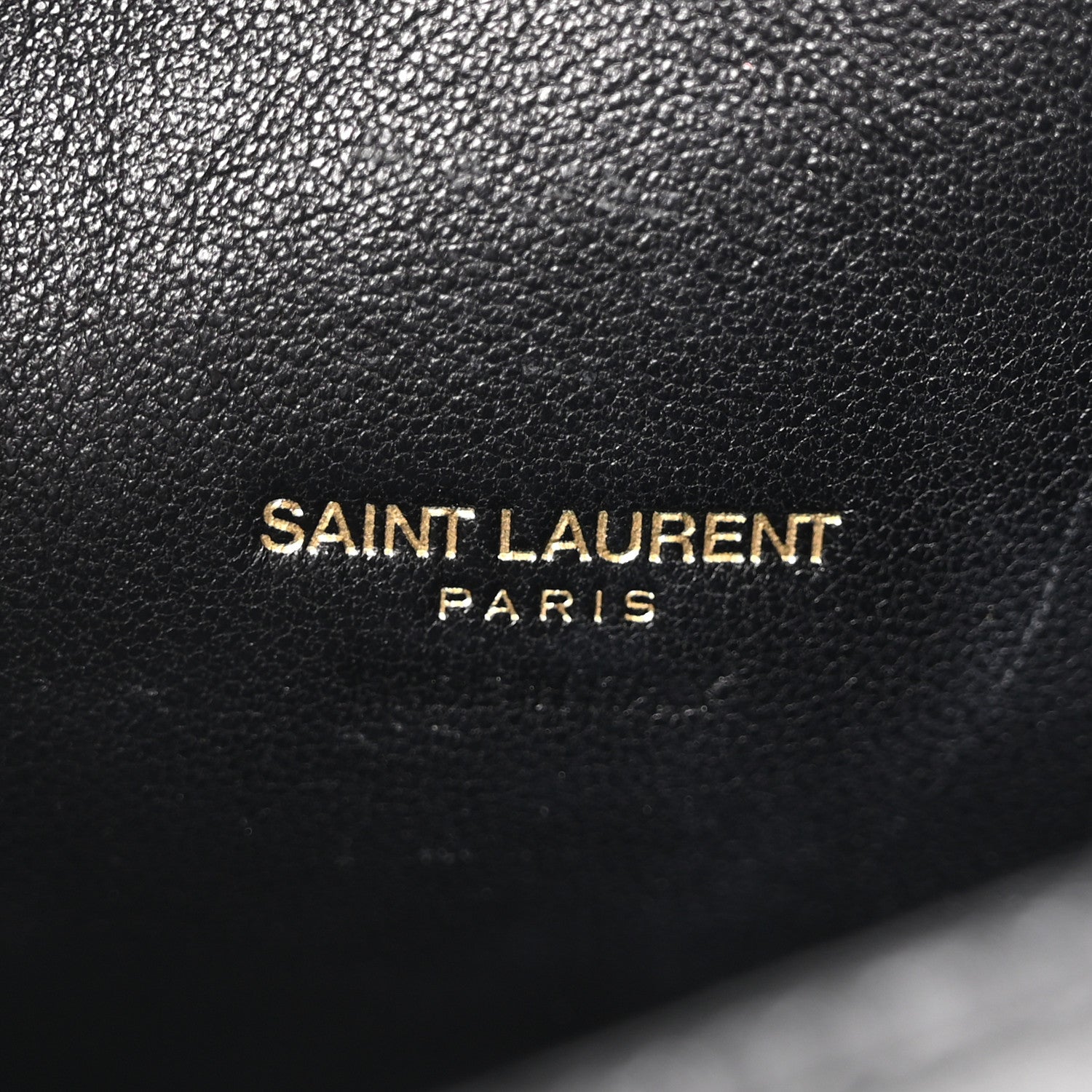 Black leather lining with Saint Laurent Paris logo stitching