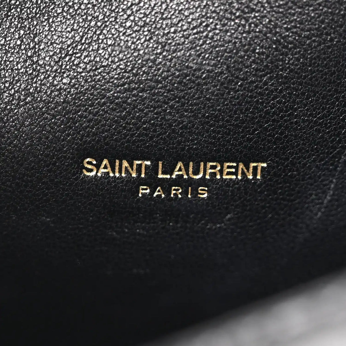 Black leather lining with Saint Laurent Paris logo stitching