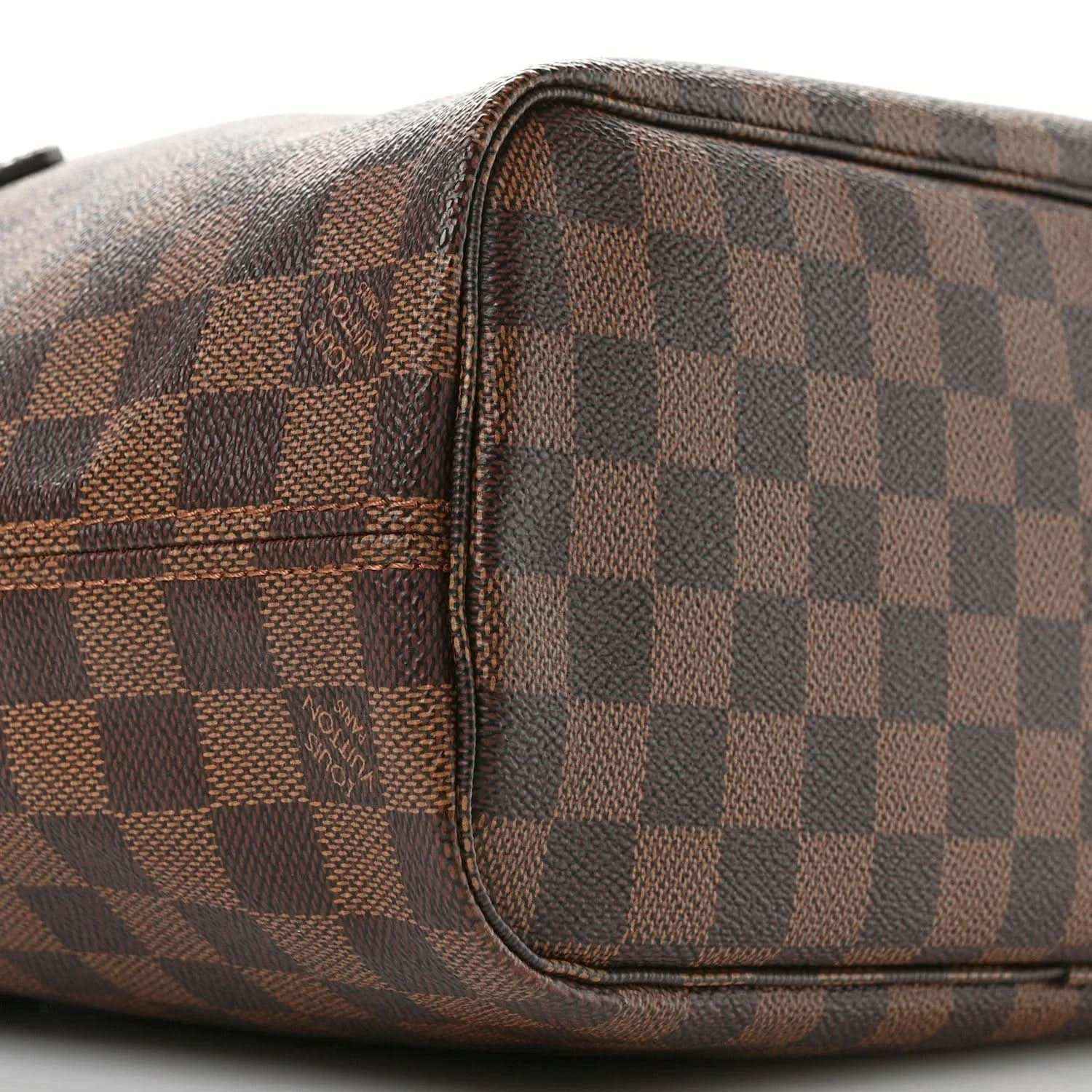 Louis Vuitton Damier Ebene Neverfull PM tote bag close-up of side zippered pocket
