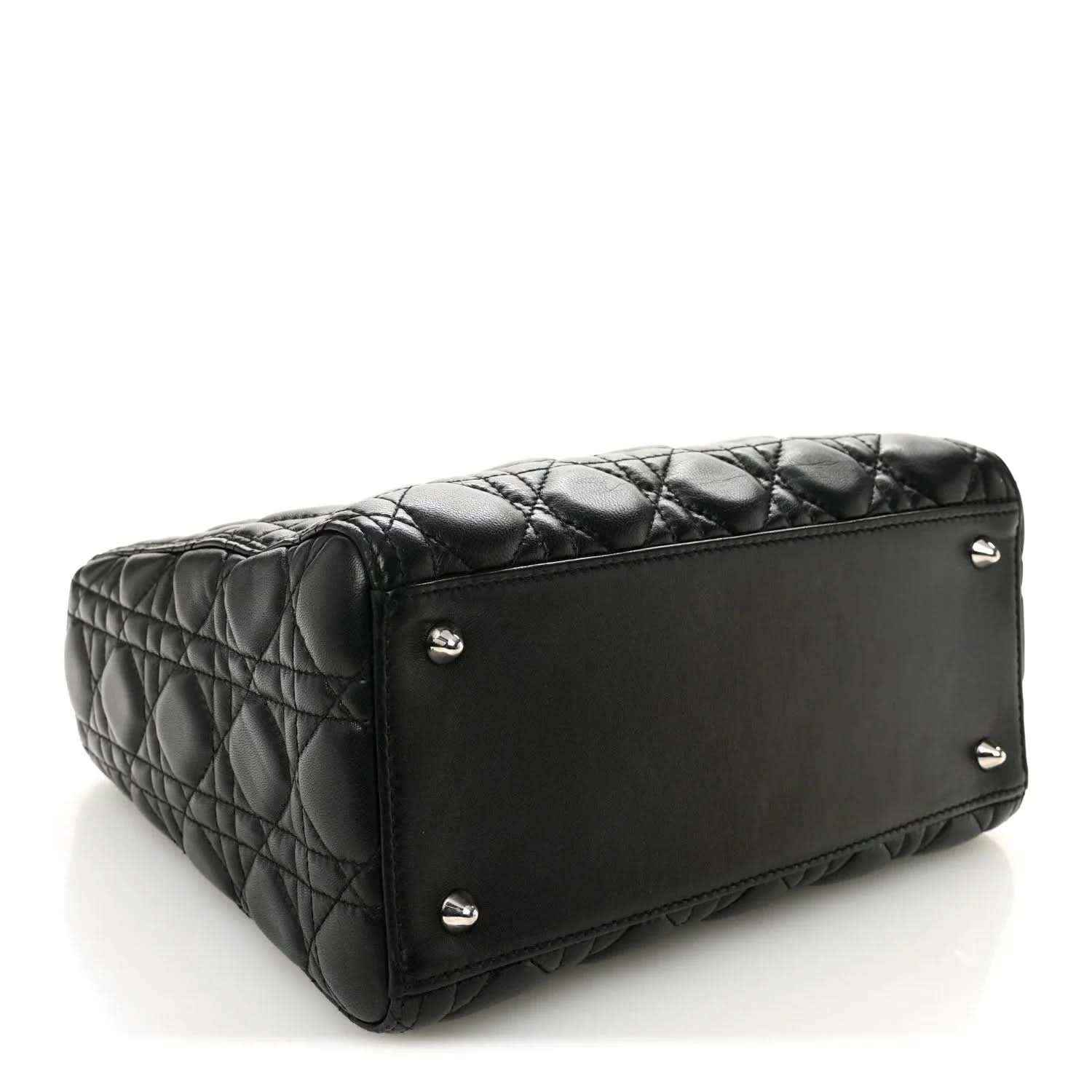 Black quilted Lady Dior handbag back corner with metal feet and top edge