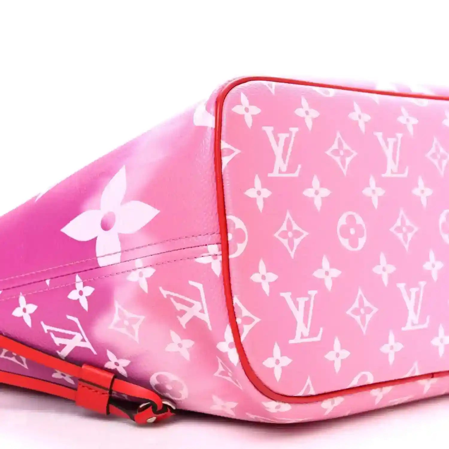 Pink monogram panel with red trim and strap detail on Louis Vuitton tote