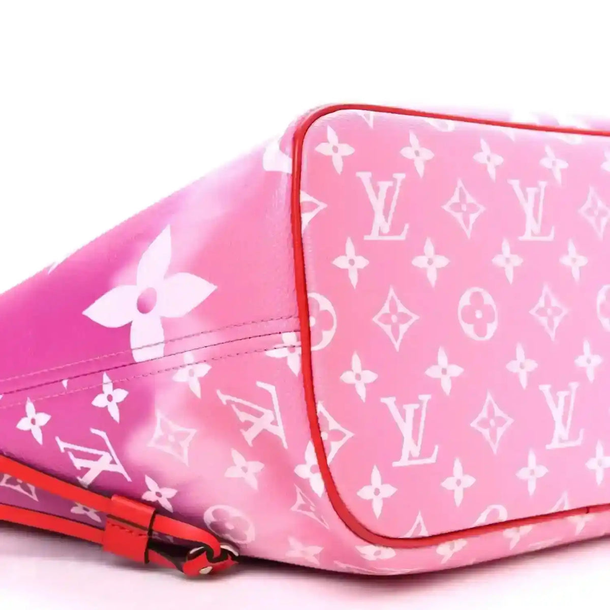 Pink monogram panel with red trim and strap detail on Louis Vuitton tote