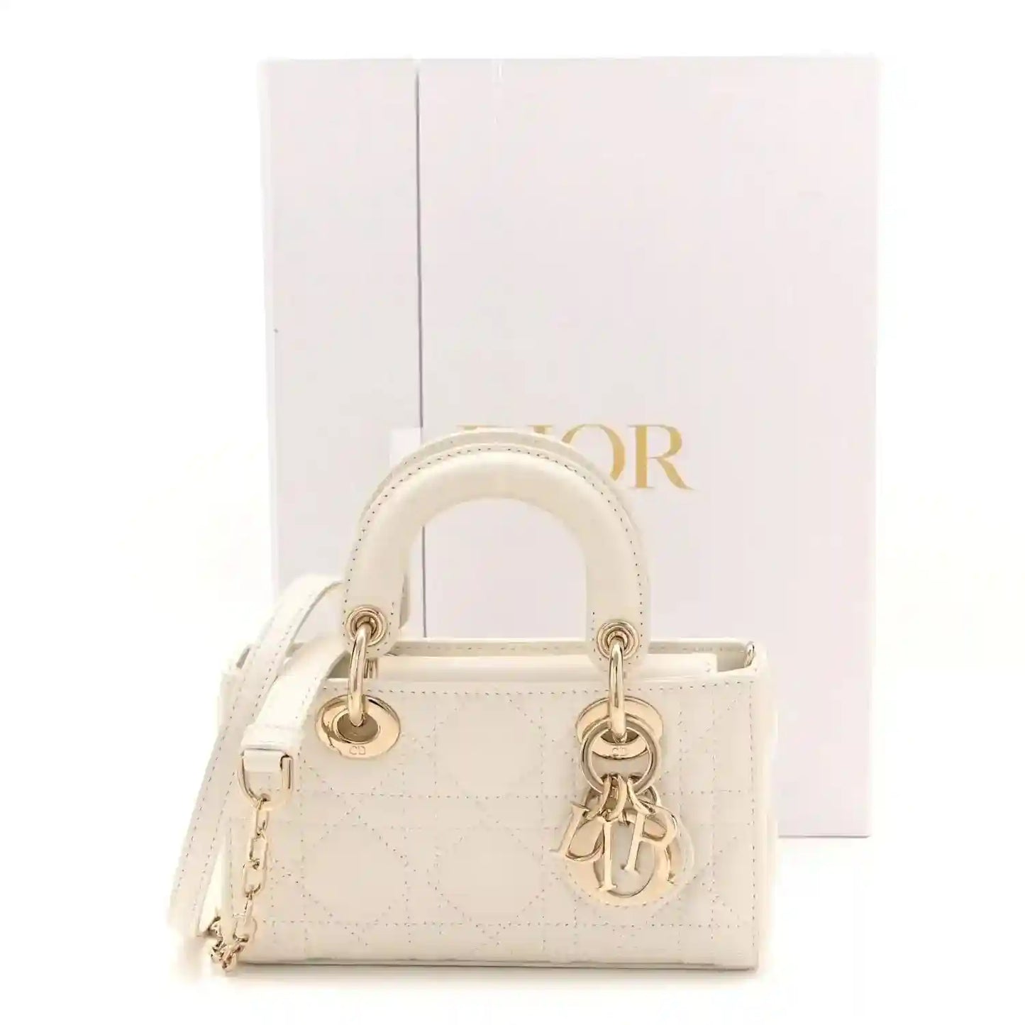 Micro Lady D-Joy lambskin bag in latte with top handles and Dior charm