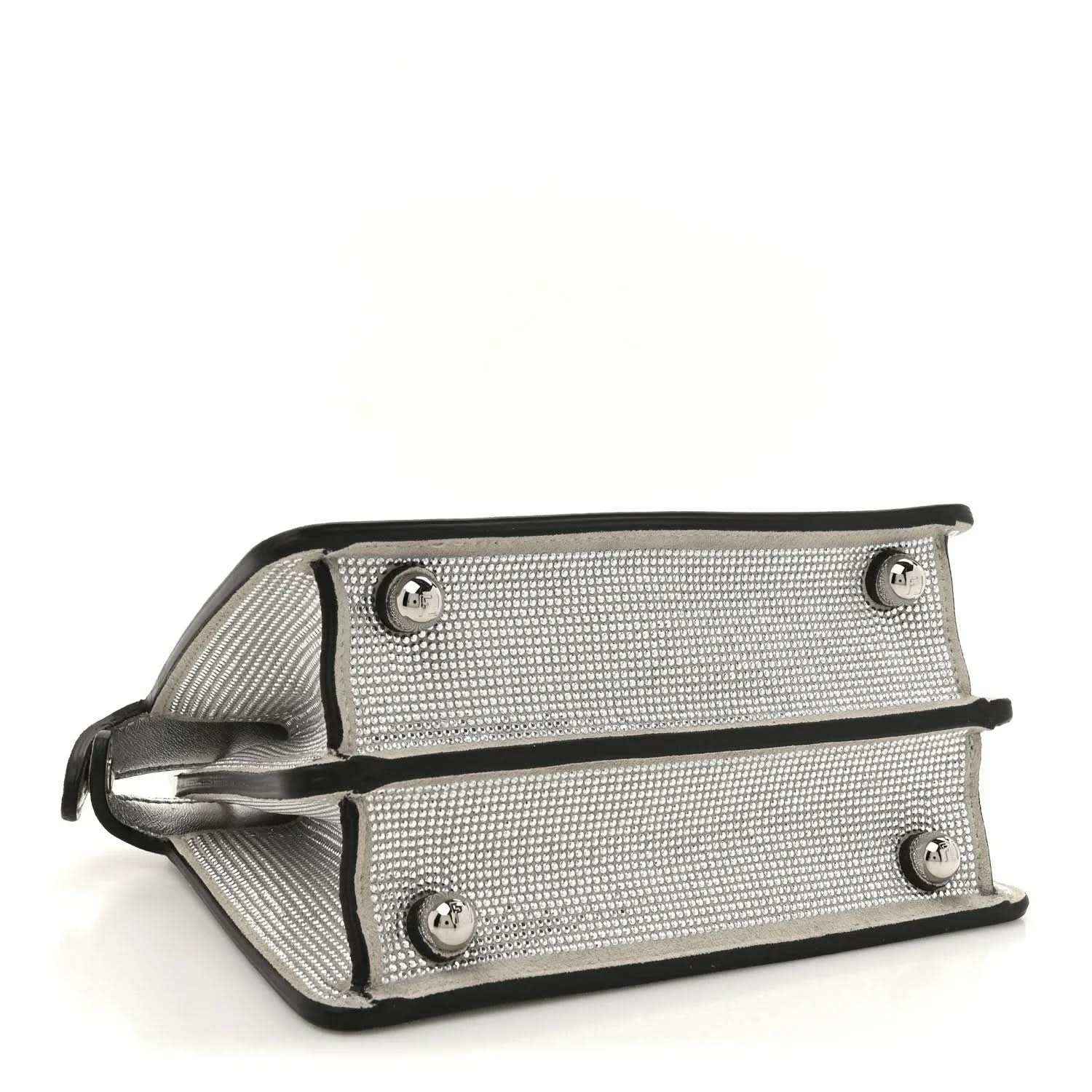 Silver crystal satchel base view with dual strap attachments and metal studs