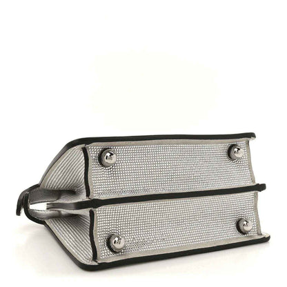 Silver crystal satchel base view with dual strap attachments and metal studs