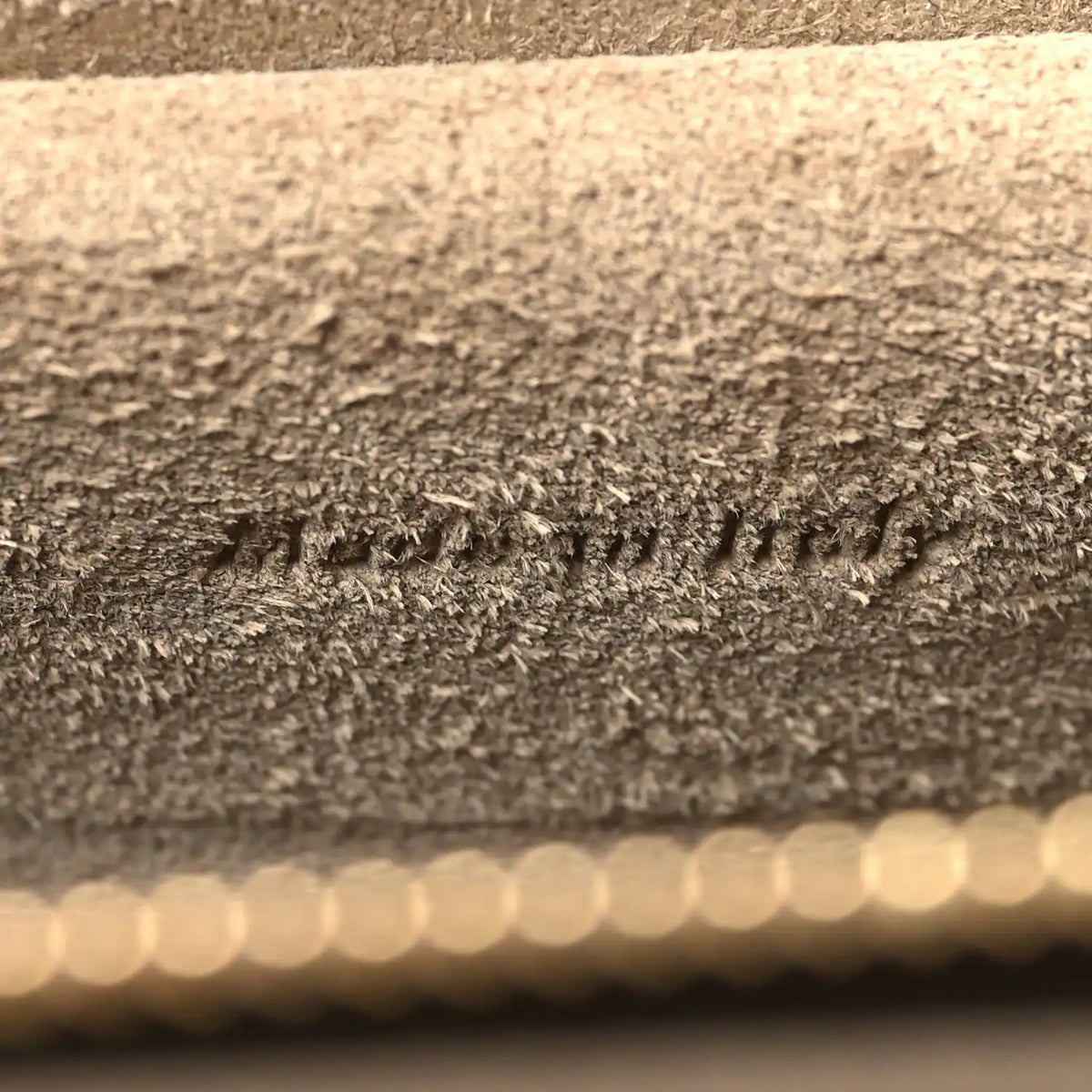 Celine micro belt bag leather close-up showing textured finish and edge trim