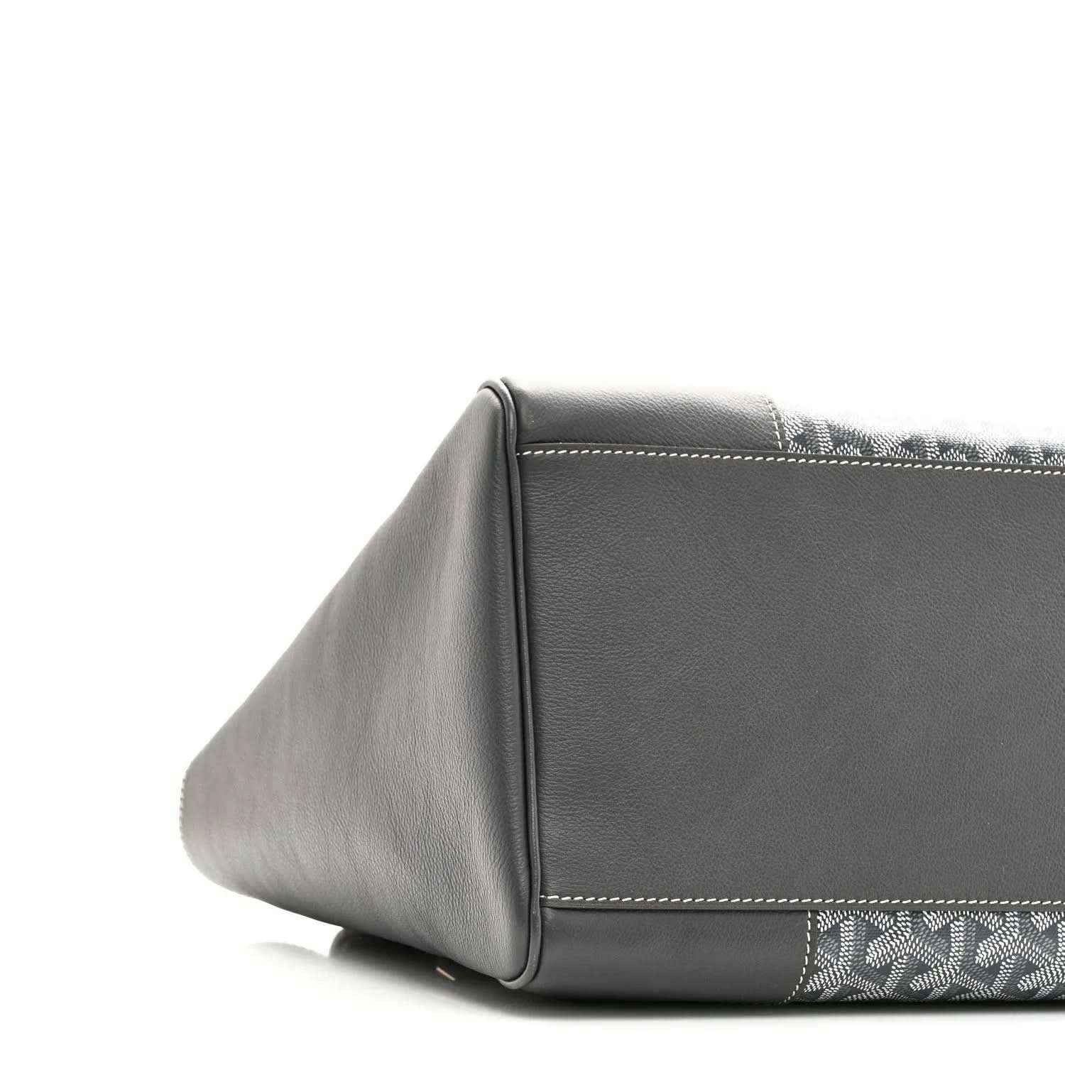 Grey leather-trimmed tote side view with patterned canvas panel near the bottom
