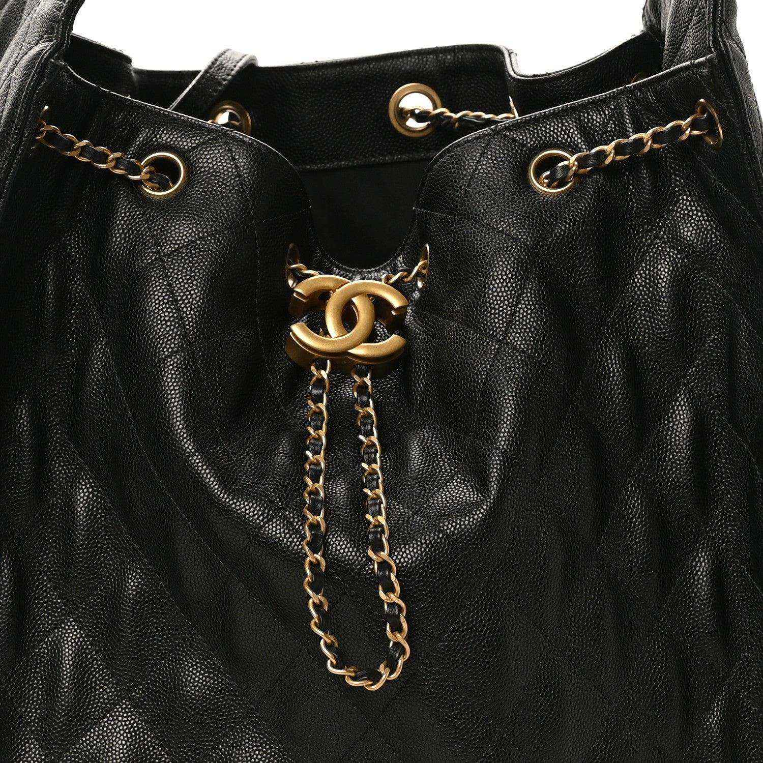 Black caviar quilted leather handbag, gold chain and CC turn-lock closure