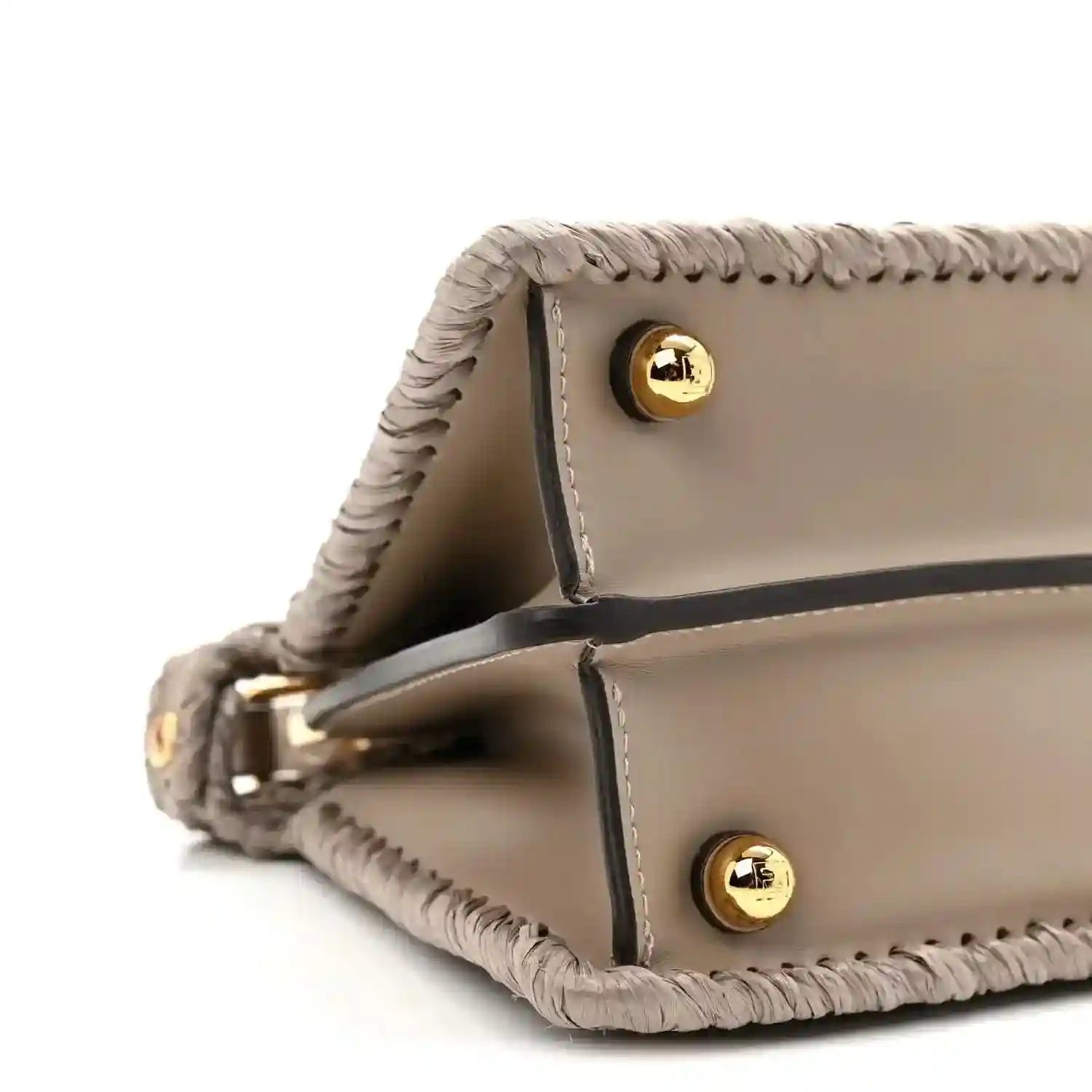 Light gray leather flap satchel with gold snap buttons and raffia edging