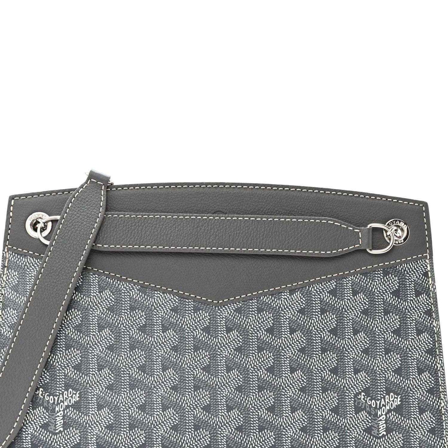 Grey shoulder bag top edge with metal hardware ring and monogram panel detail
