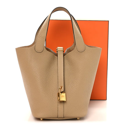 Picotin Lock 18 PM leather tote, tan pebble-grain with top handles and front lock
