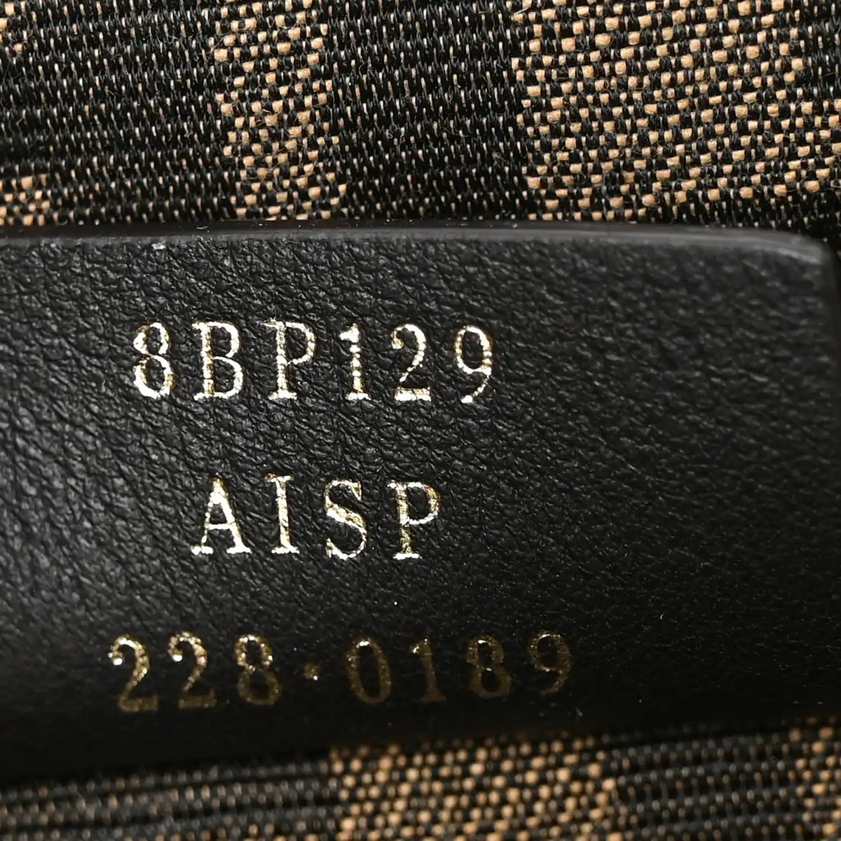 Black leather stamping with 8B P129 AISP 228 0189