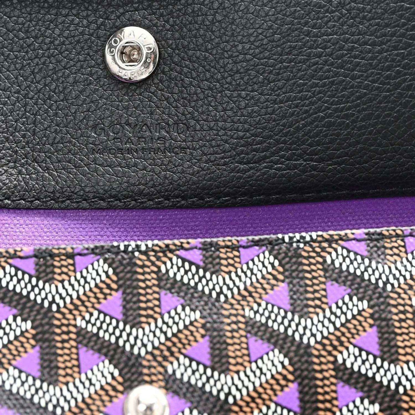 Tote bag logo patch and monogram pattern trim, black leather top with purple lining