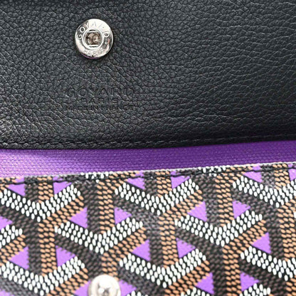 Tote bag logo patch and monogram pattern trim, black leather top with purple lining