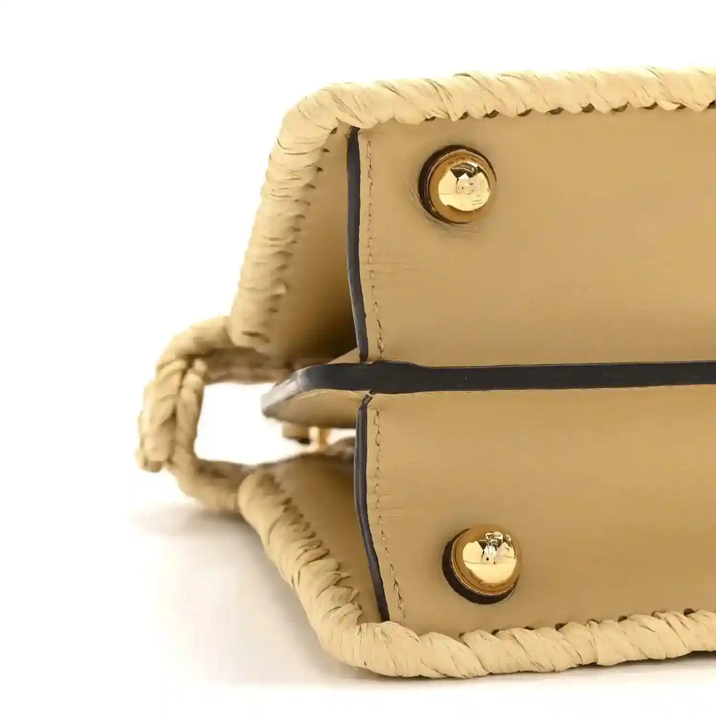 Petite raffia satchel bag side view with tan leather flap and gold snap buttons.