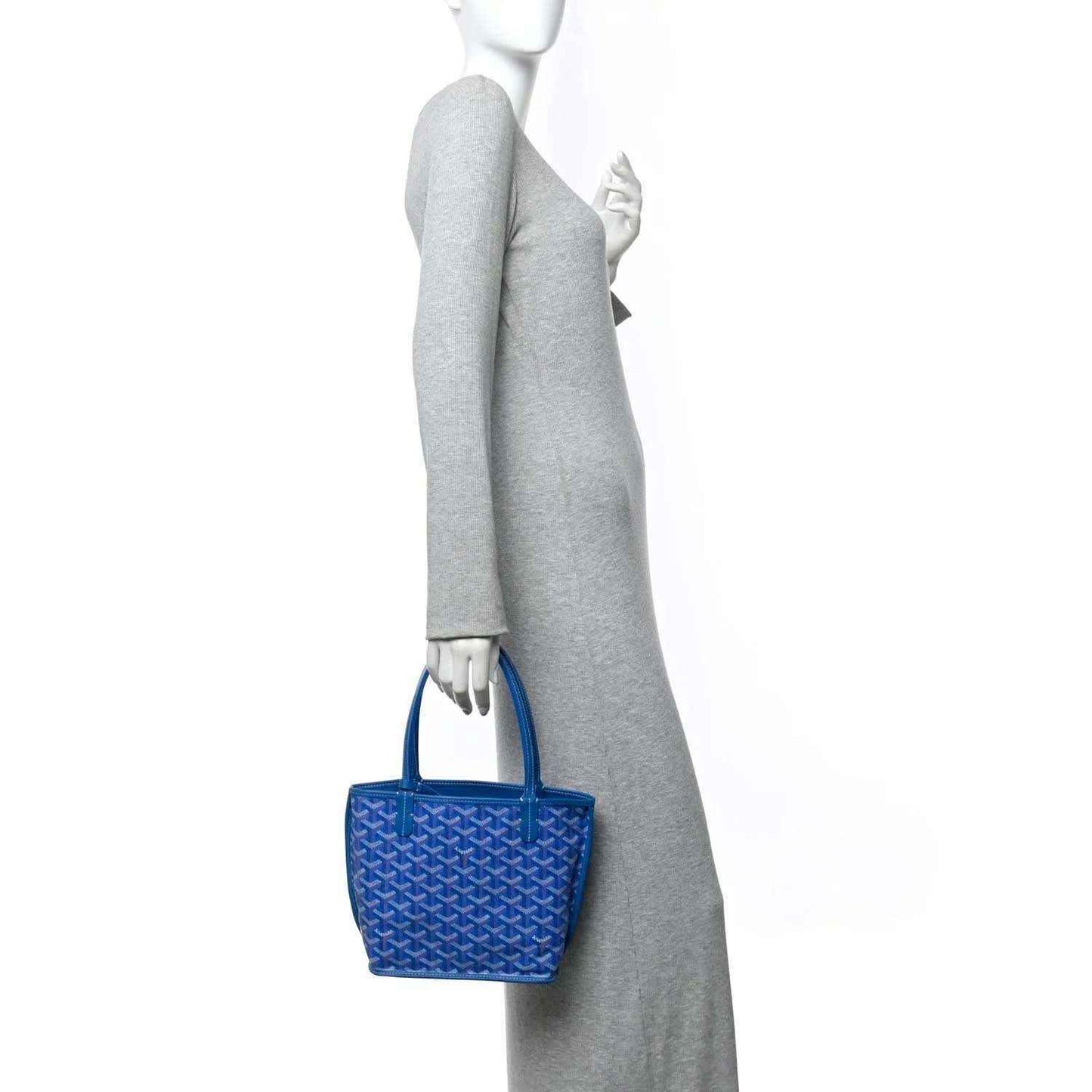 Sky blue mini tote bag with top handles and small structured silhouette