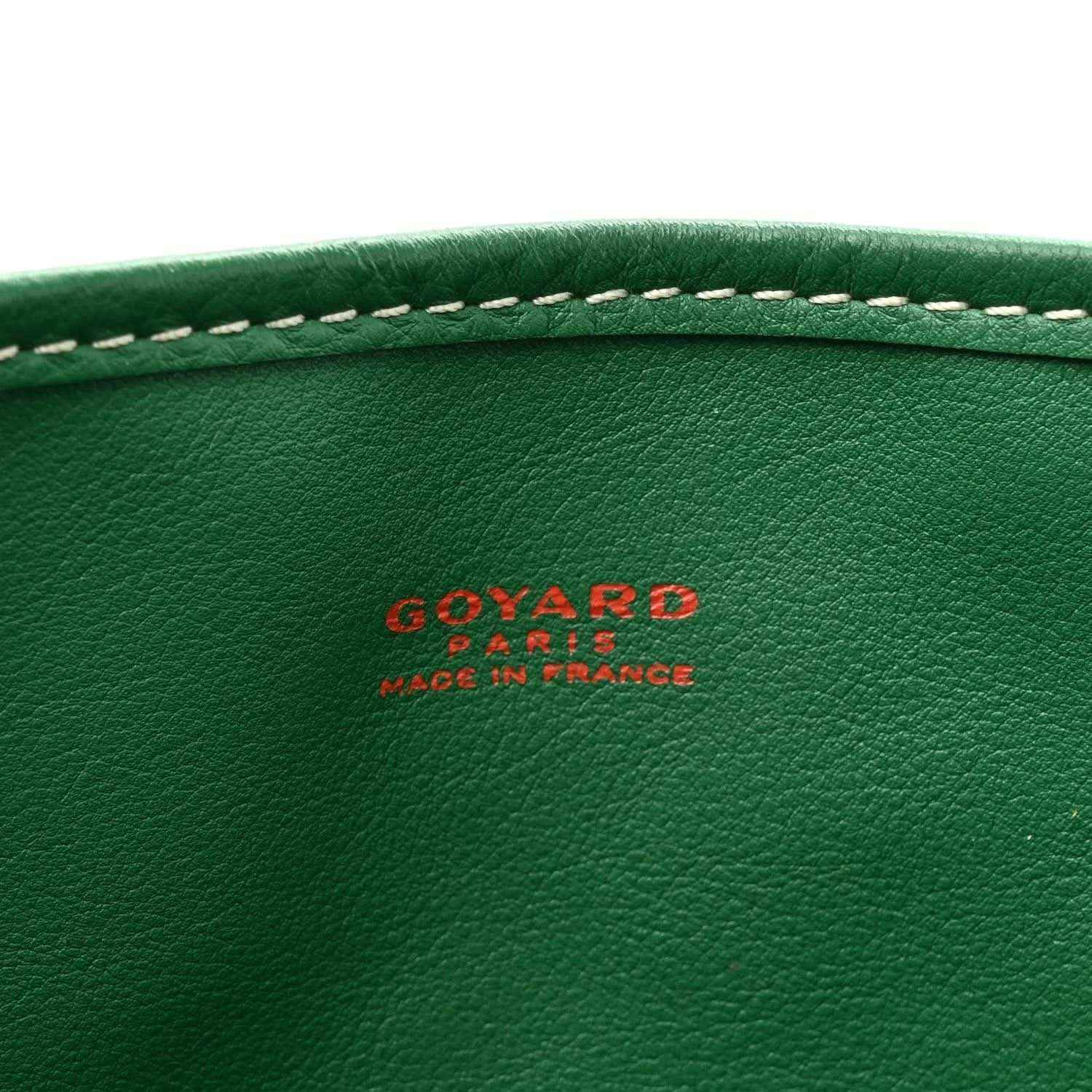 Green leather panel with GOYARD logo and 'made in france' text