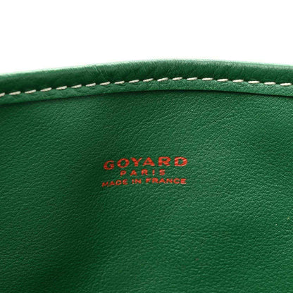 Green leather panel with GOYARD logo and 'made in france' text