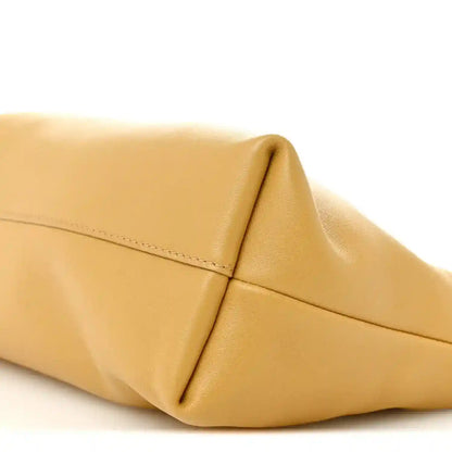 Sahara nappa leather clutch with curved front panel and stitched seam
