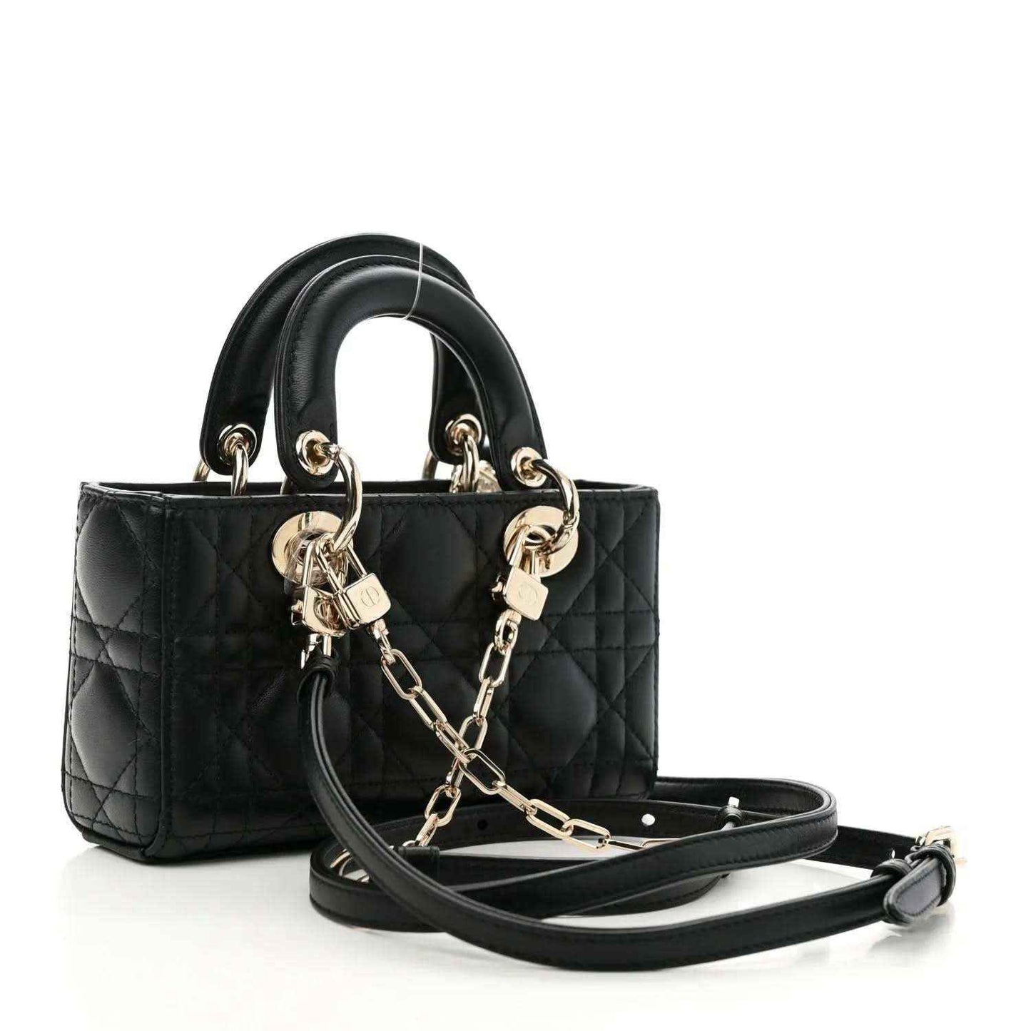 Black quilted lambskin micro handbag with top handles and detachable crossbody strap