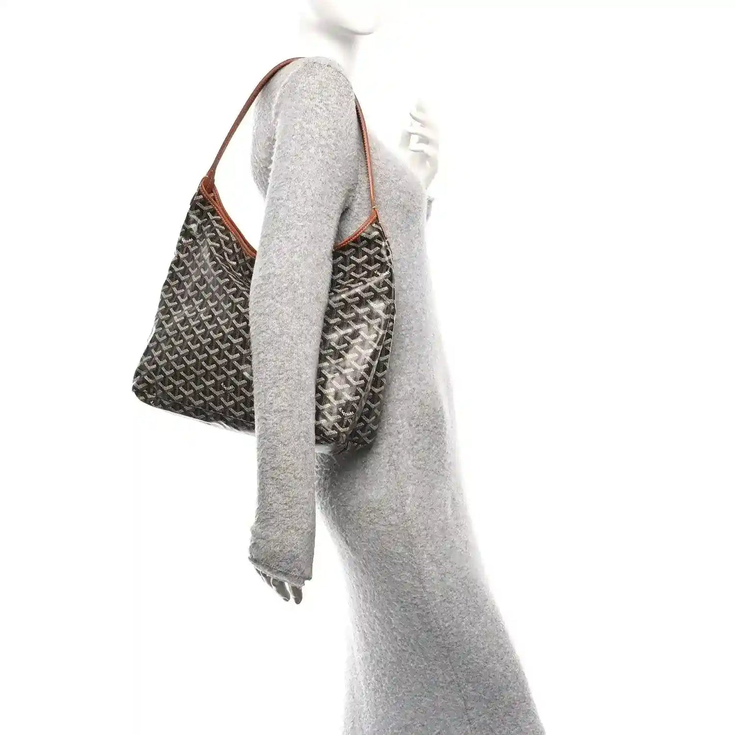 Goyard hobo bag, side view, dark patterned canvas with brown leather top strap